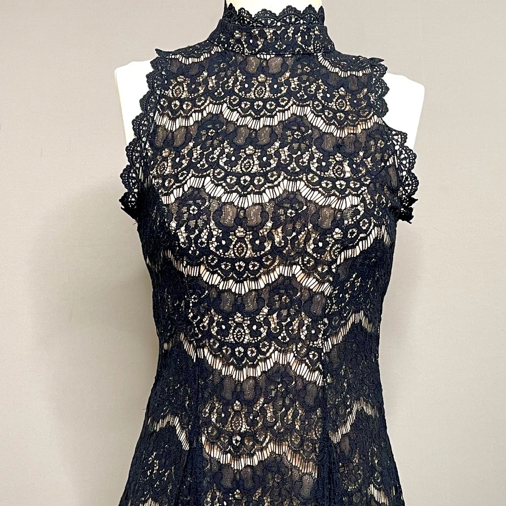 Black lace short sleeve mini dress.
